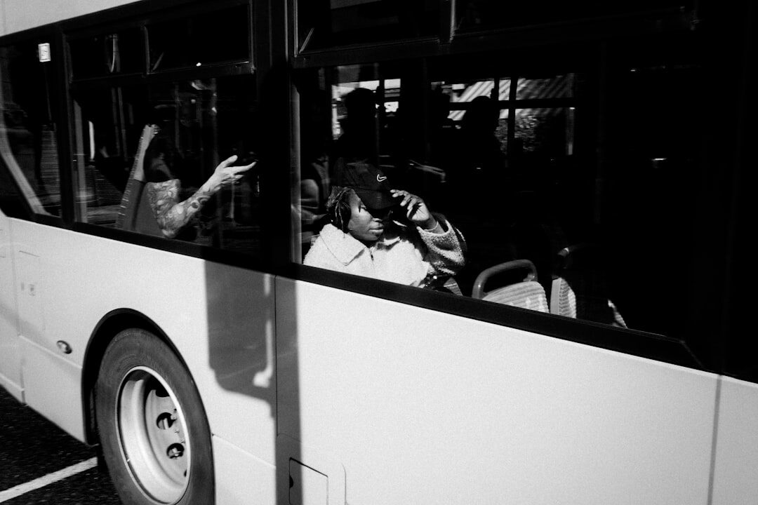woman helping stranger on bus