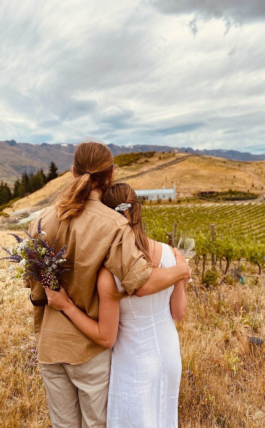 family working in vineyard